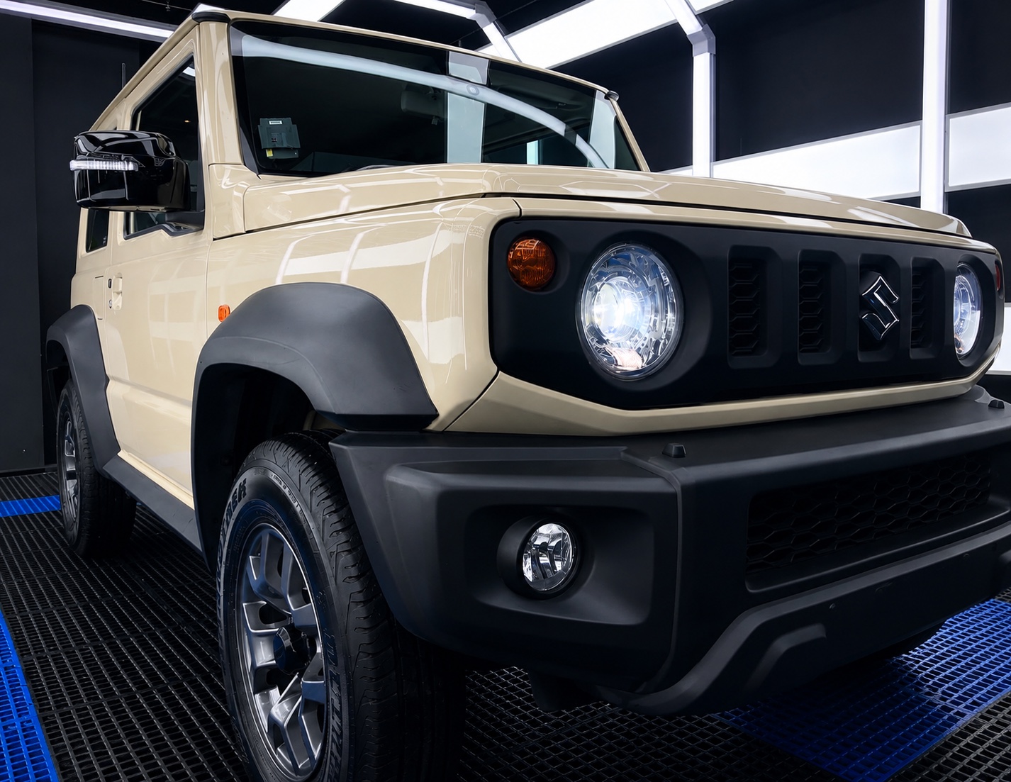 Sand-coloured Suzuki four-wheel drive after care by Pure
